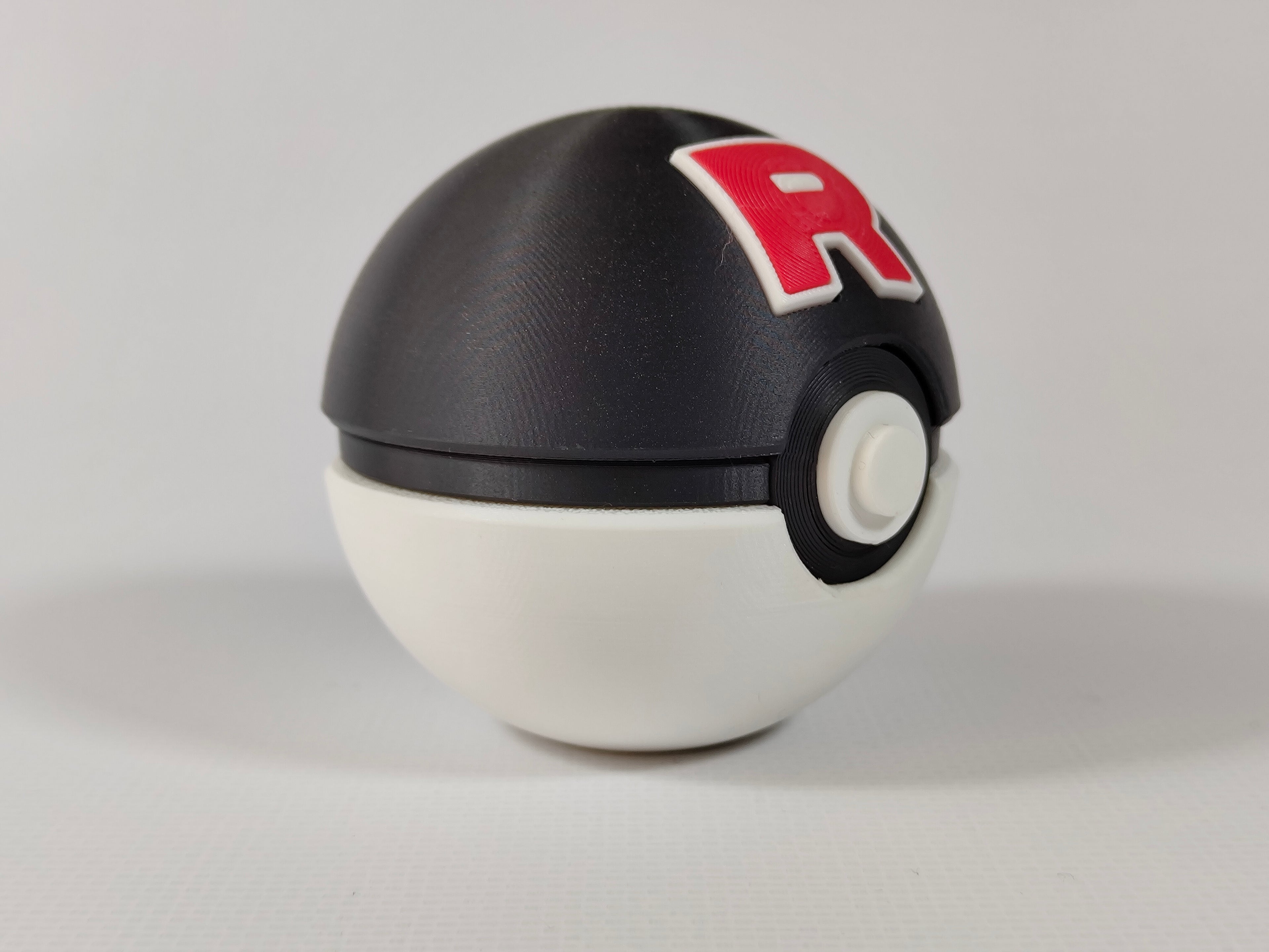Team Rocket Ball Pokemon Figürü