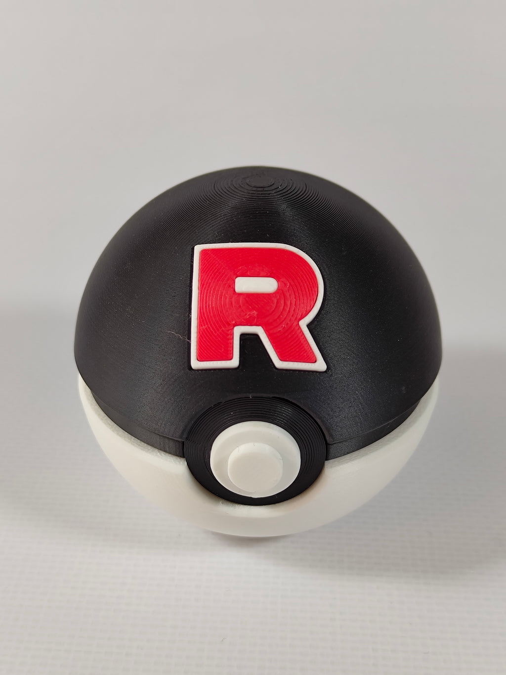 Team Rocket Ball Pokemon Figürü