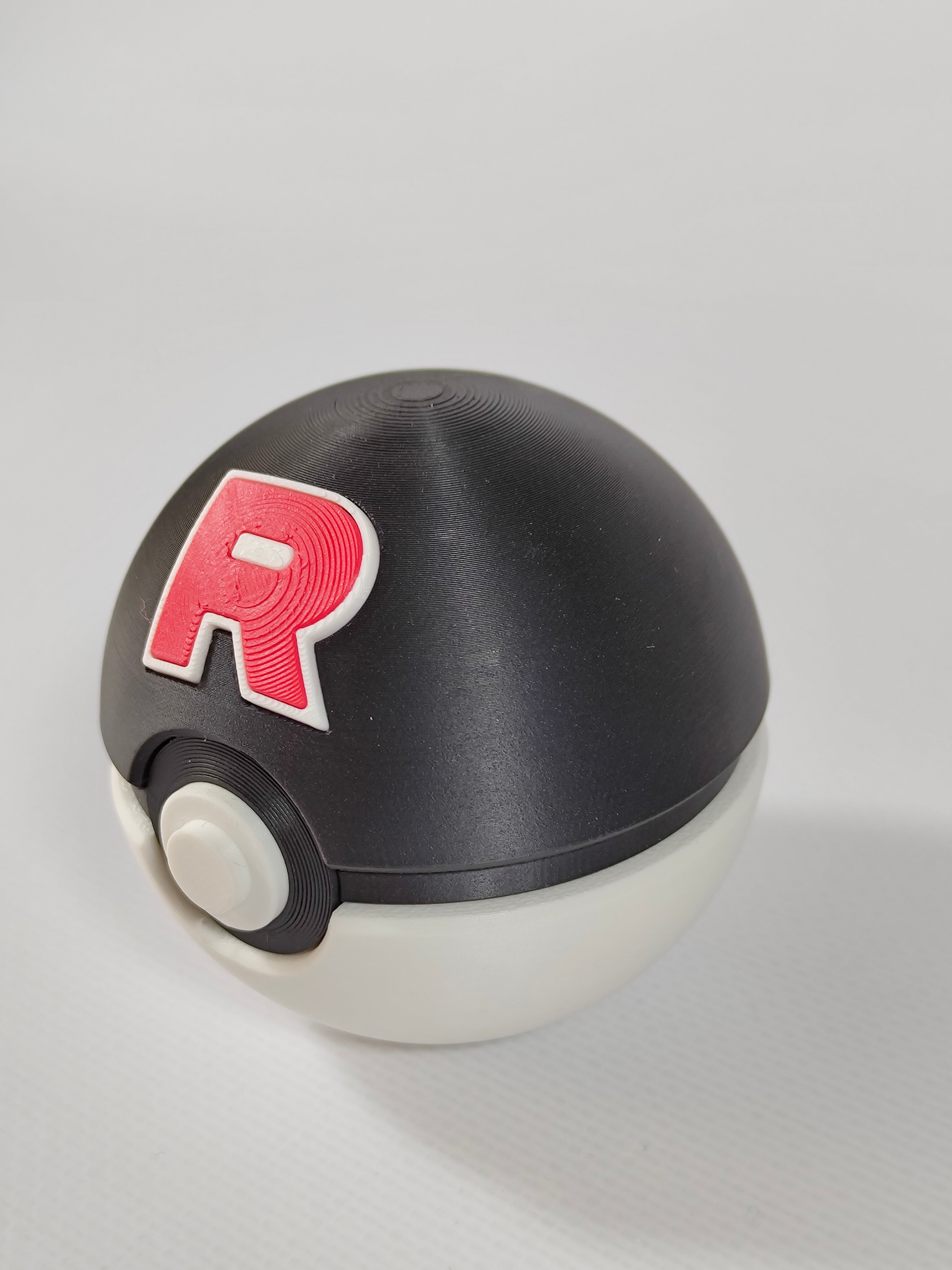 Team Rocket Ball Pokemon Figürü