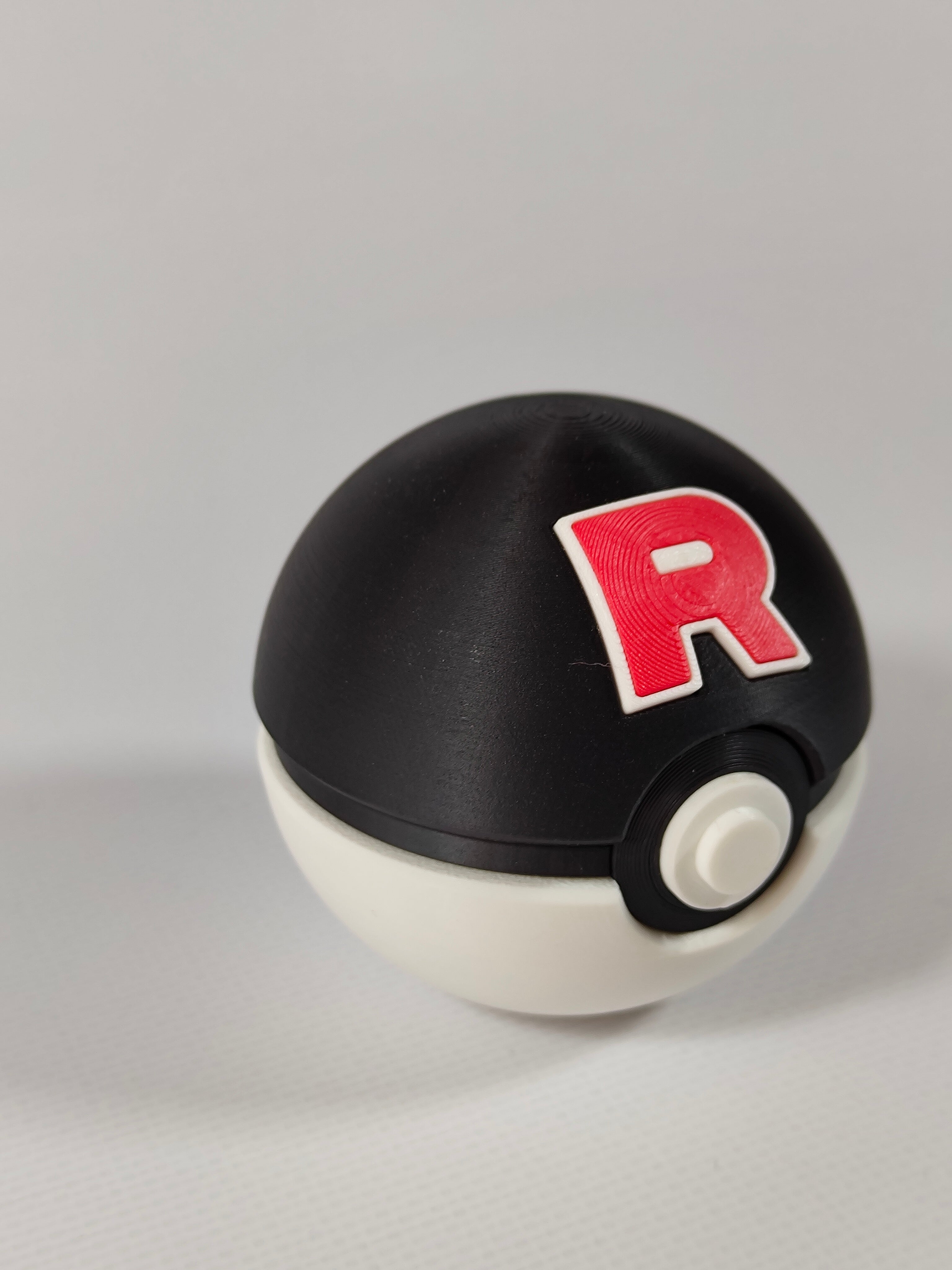 Team Rocket Ball Pokemon Figürü